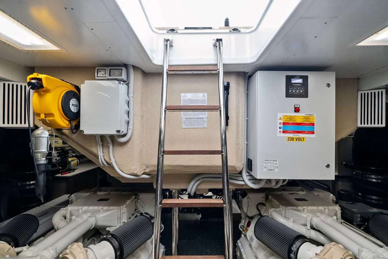 The engine room features well-organized machinery and equipment, ensuring optimal performance and maintenance. aboard LADY F Yacht for Sale