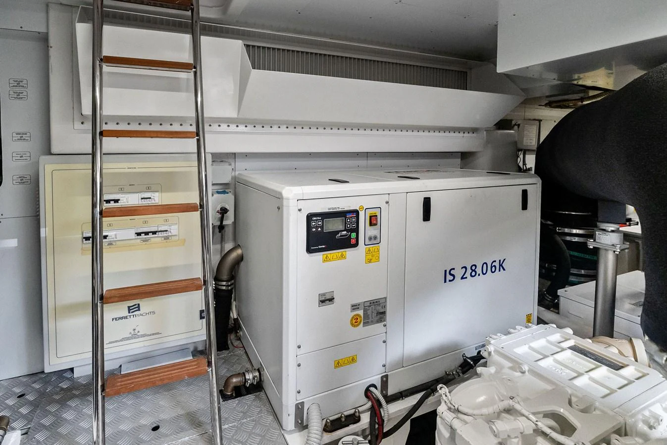 The image showcases the technical equipment and machinery in the yacht's engine room. aboard LADY F Yacht for Sale