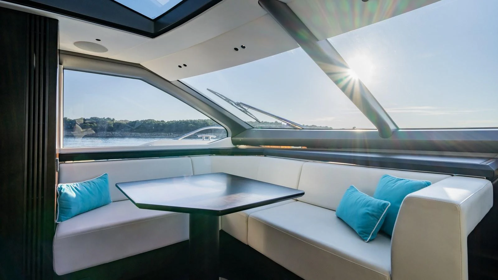 The saloon offers a bright and inviting space with panoramic views and comfortable seating. aboard TRIPLE EIGHT Yacht for Sale