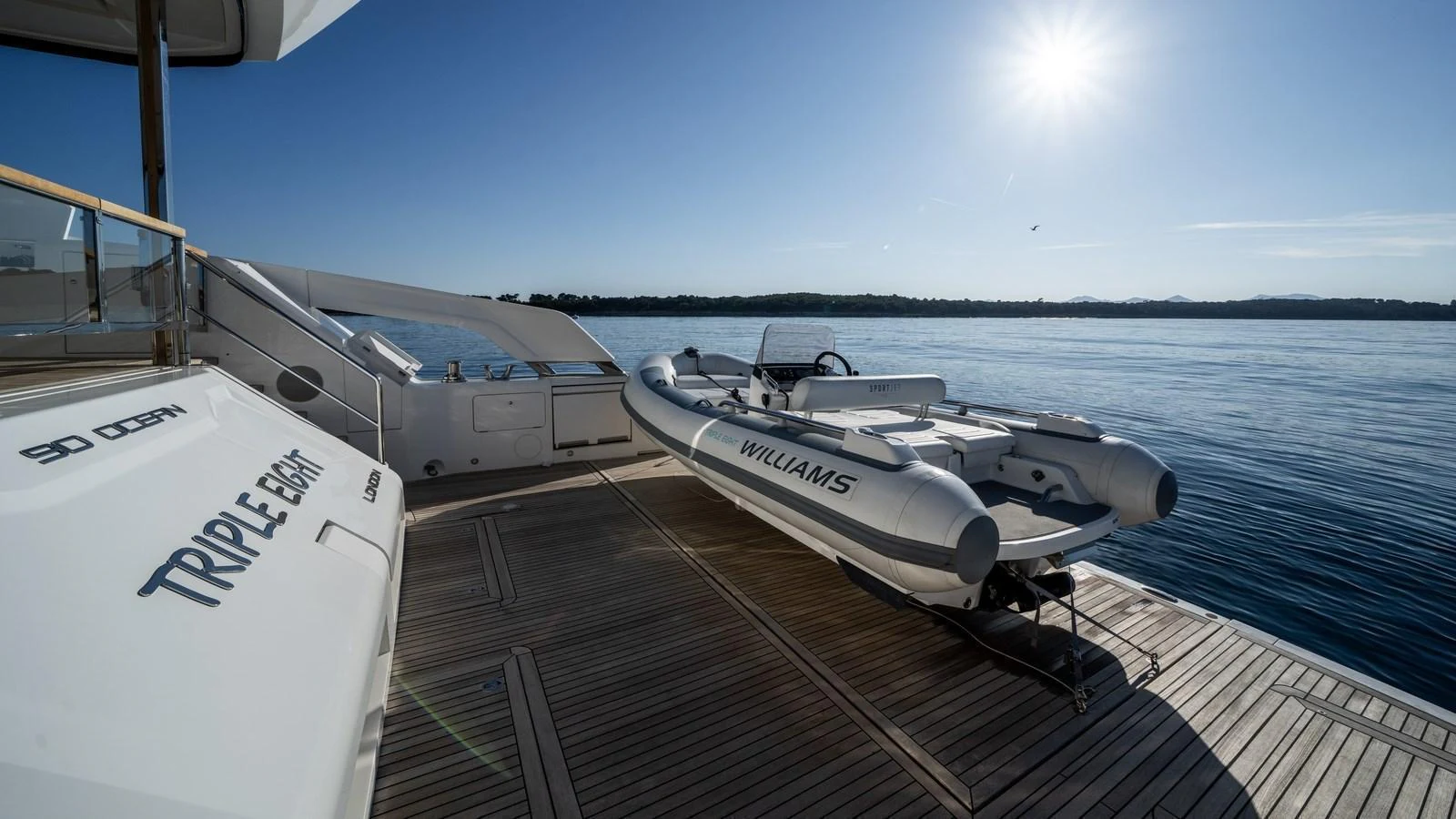 A sleek tender is positioned on the aft deck, ready for an adventure on the water. aboard TRIPLE EIGHT Yacht for Sale