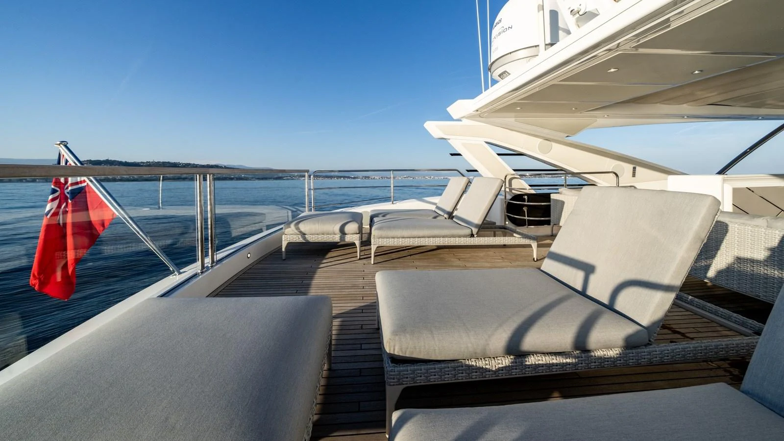 The sundeck offers luxurious lounging with comfortable sunbeds and a stunning view of the water. aboard TRIPLE EIGHT Yacht for Sale
