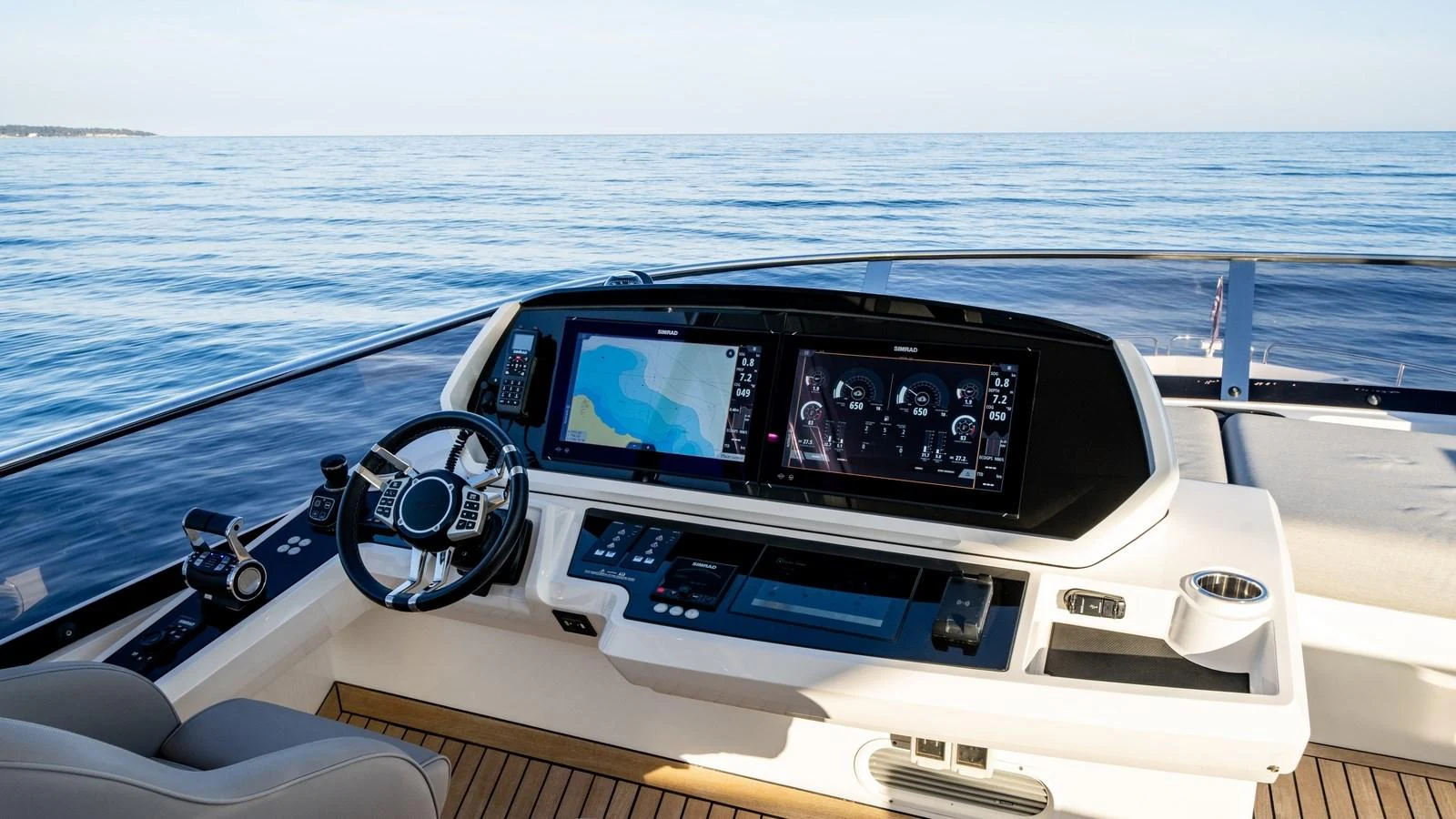 The yacht's helm features advanced navigation systems and a sleek design, offering a commanding view of the open sea. aboard TRIPLE EIGHT Yacht for Sale