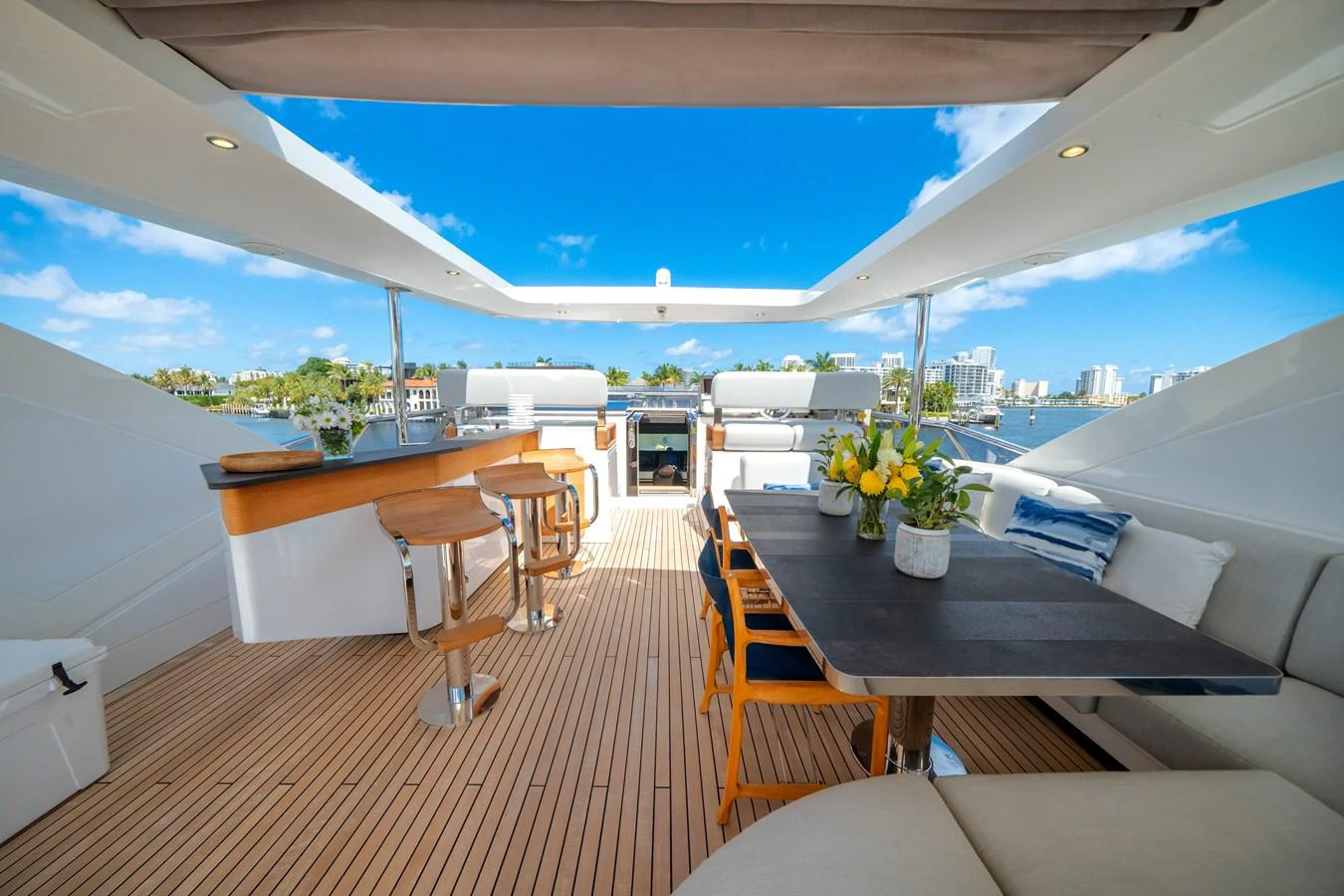 The aft deck offers a spacious and inviting area for alfresco dining and relaxation with stunning views. aboard PIER PRESSURE Yacht for Sale