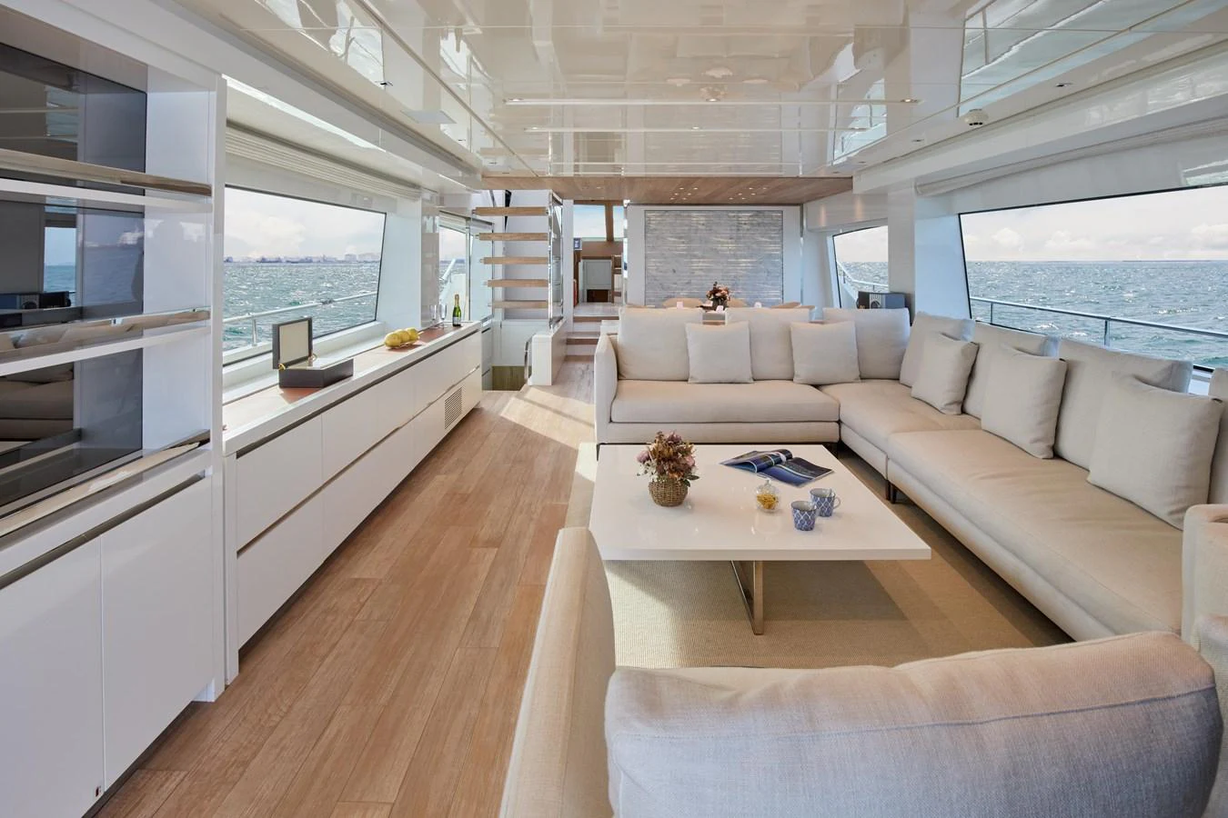 The spacious salon offers panoramic views and luxurious seating arrangements. aboard TNT LEISURE Yacht for Sale