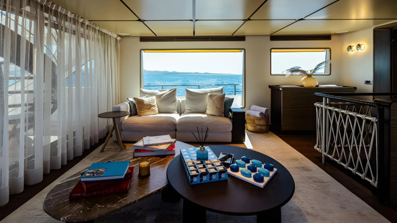 The salon offers a cozy and stylish seating area with a stunning view of the sea. aboard MARCH SUNRISE Yacht for Sale