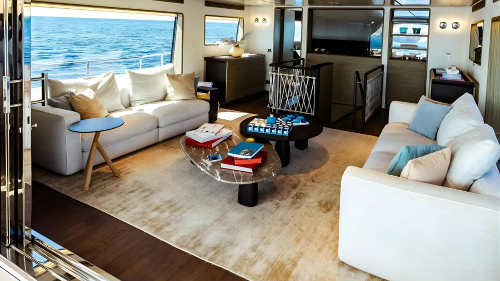 The salon offers a spacious and luxurious seating area with panoramic ocean views. aboard MARCH SUNRISE Yacht for Sale