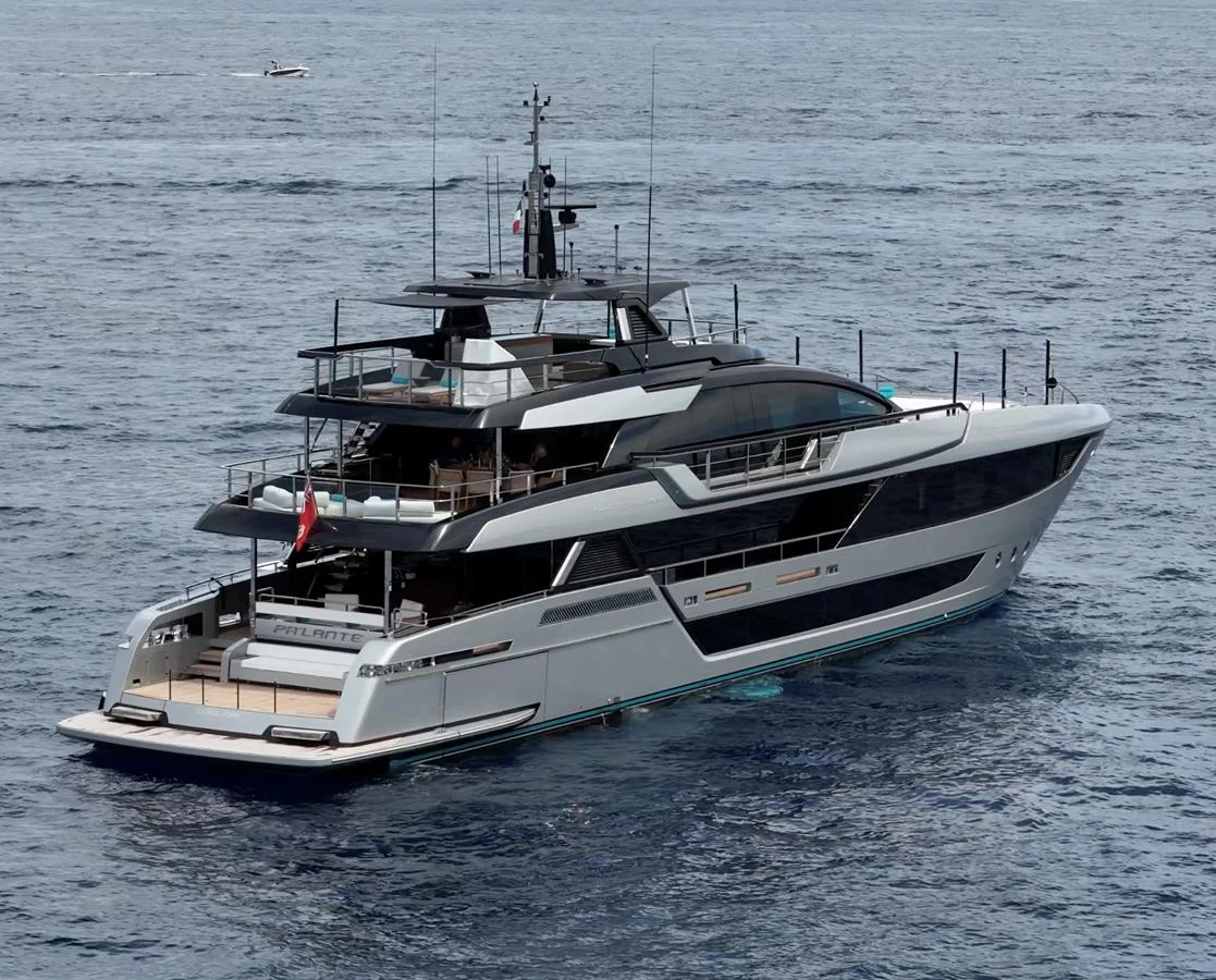 A sleek and modern yacht cruising on calm waters, showcasing its elegant design and spacious decks. aboard ´LANTE Yacht for Sale
