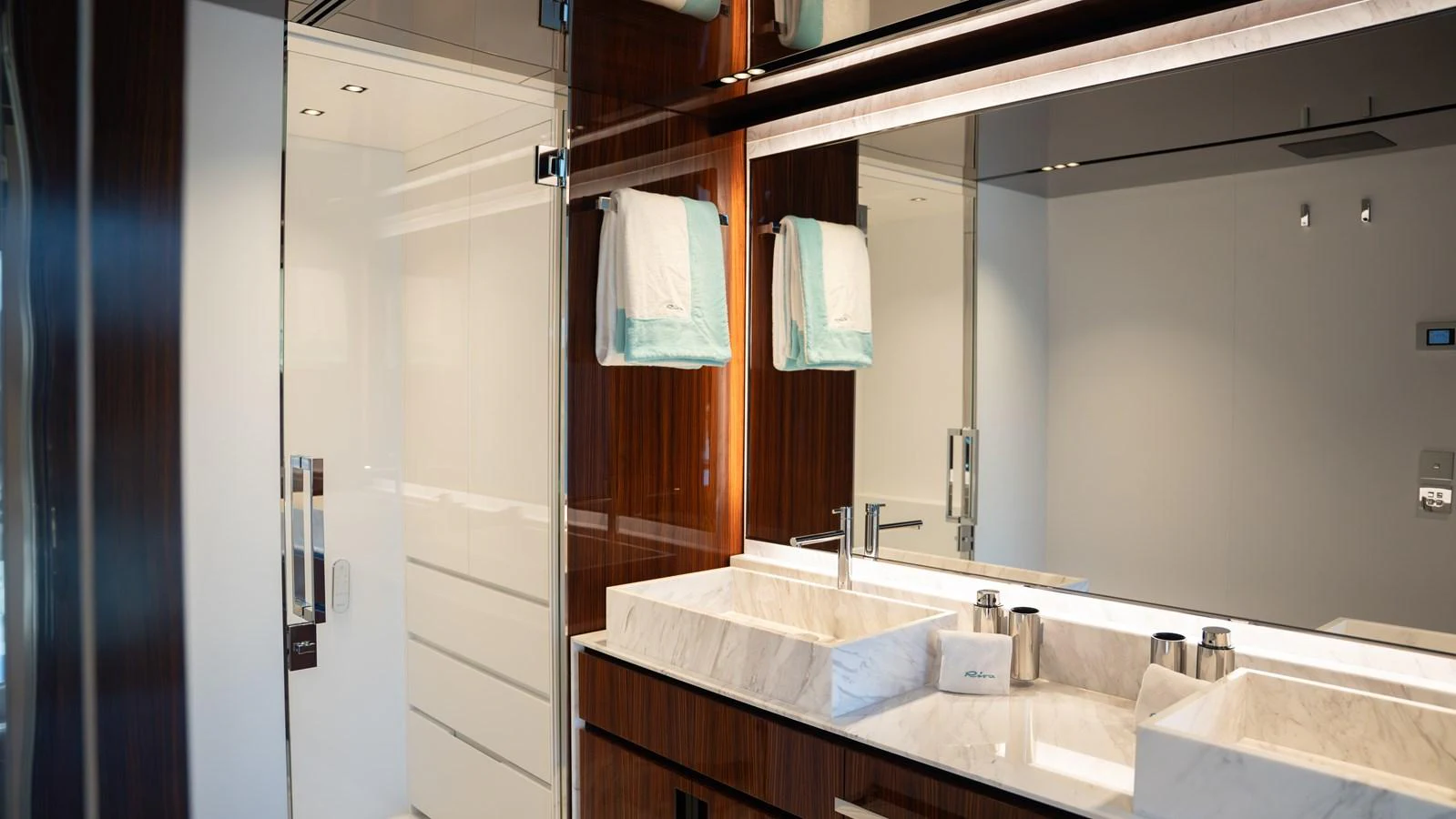 The yacht's bathroom features a sleek design with a marble countertop and modern fixtures. aboard ´LANTE Yacht for Sale