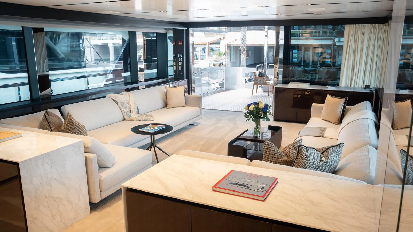 The spacious salon features elegant seating arrangements and ample natural light. aboard ´LANTE Yacht for Sale