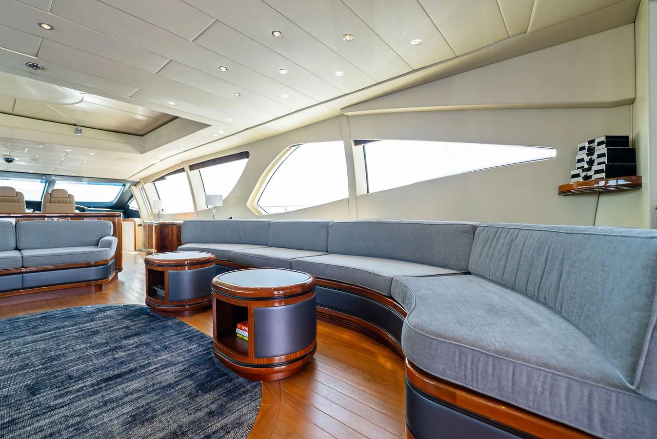 The spacious salon features elegant seating and modern design elements. aboard INCOGNITO Yacht for Sale