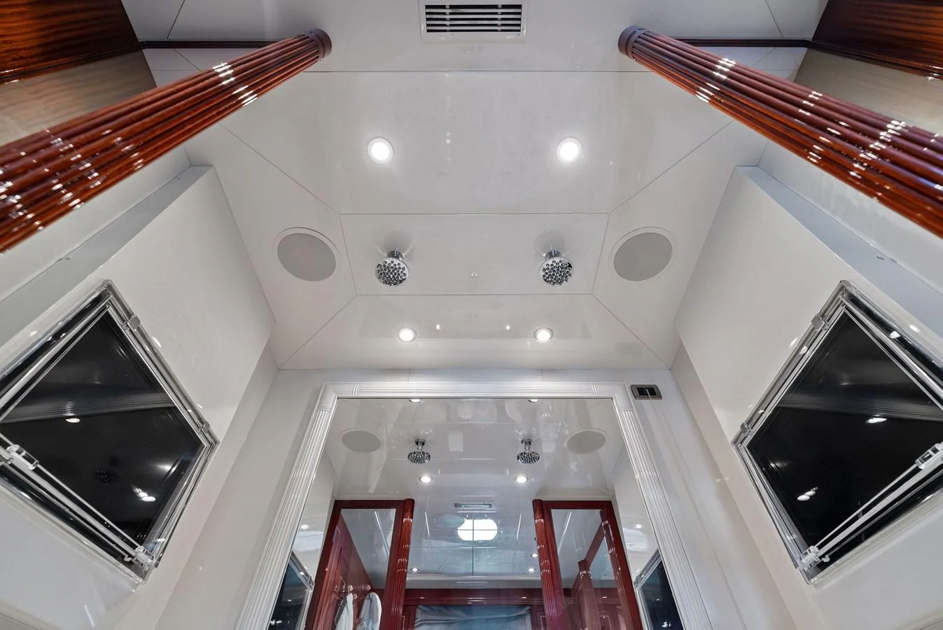 The interior features a sleek, modern design with polished wood accents and ample lighting. aboard INCOGNITO Yacht for Sale