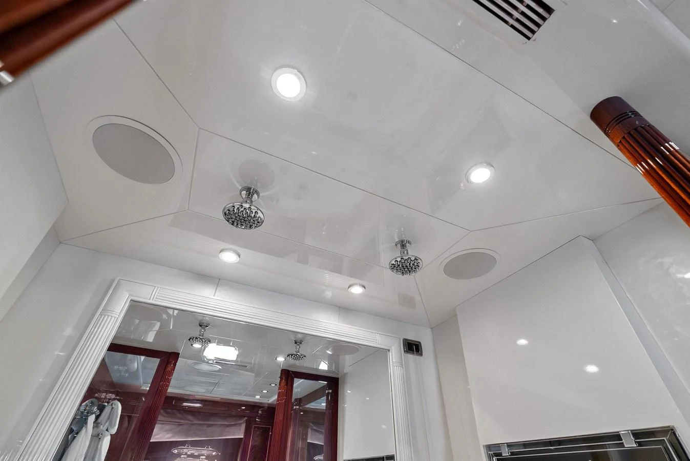 The image showcases a luxurious yacht interior with modern lighting and fixtures. aboard INCOGNITO Yacht for Sale