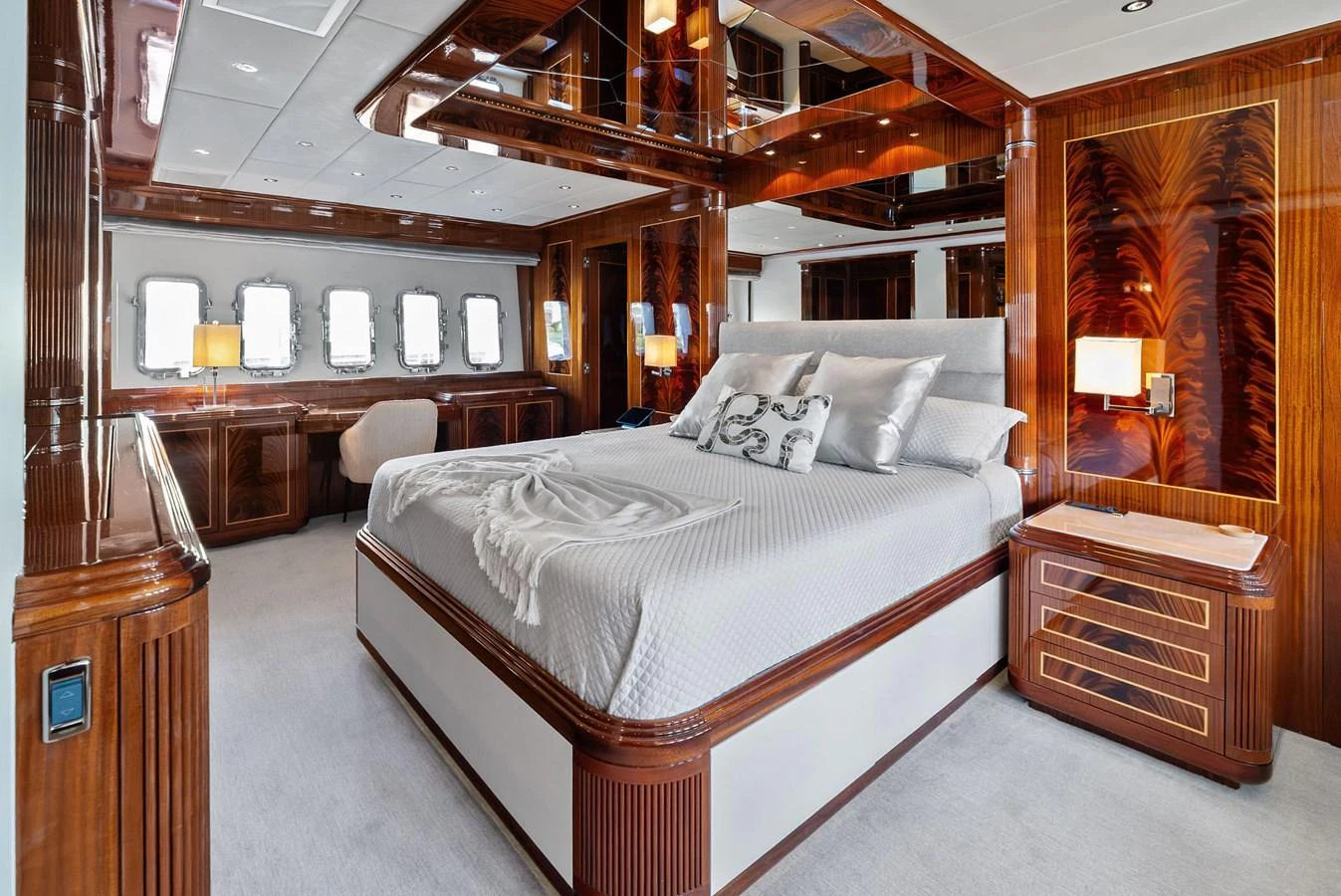 The master stateroom features luxurious wood finishes and elegant decor. aboard INCOGNITO Yacht for Sale