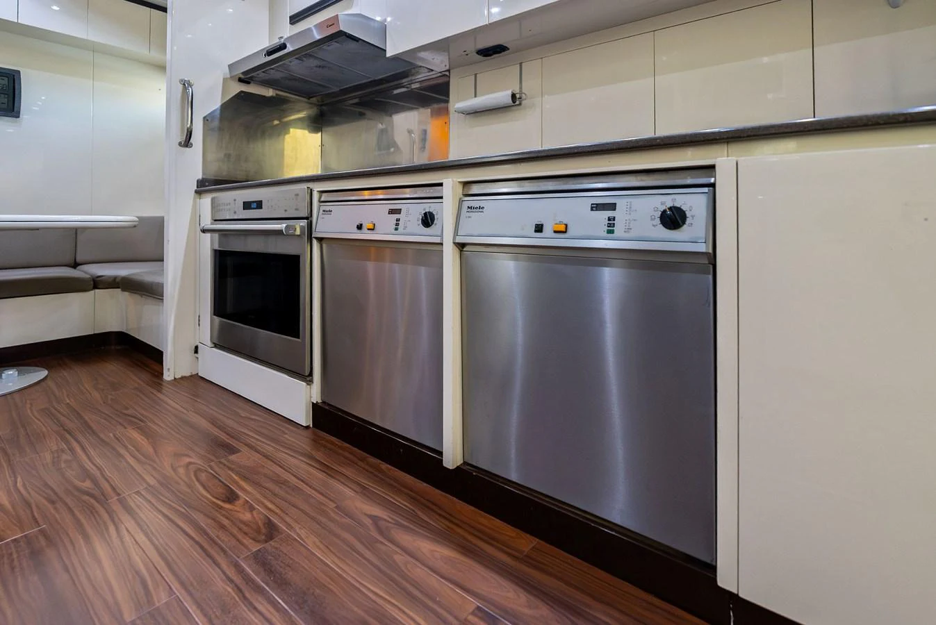 The galley features modern appliances and sleek cabinetry, perfect for gourmet cooking at sea. aboard INCOGNITO Yacht for Sale
