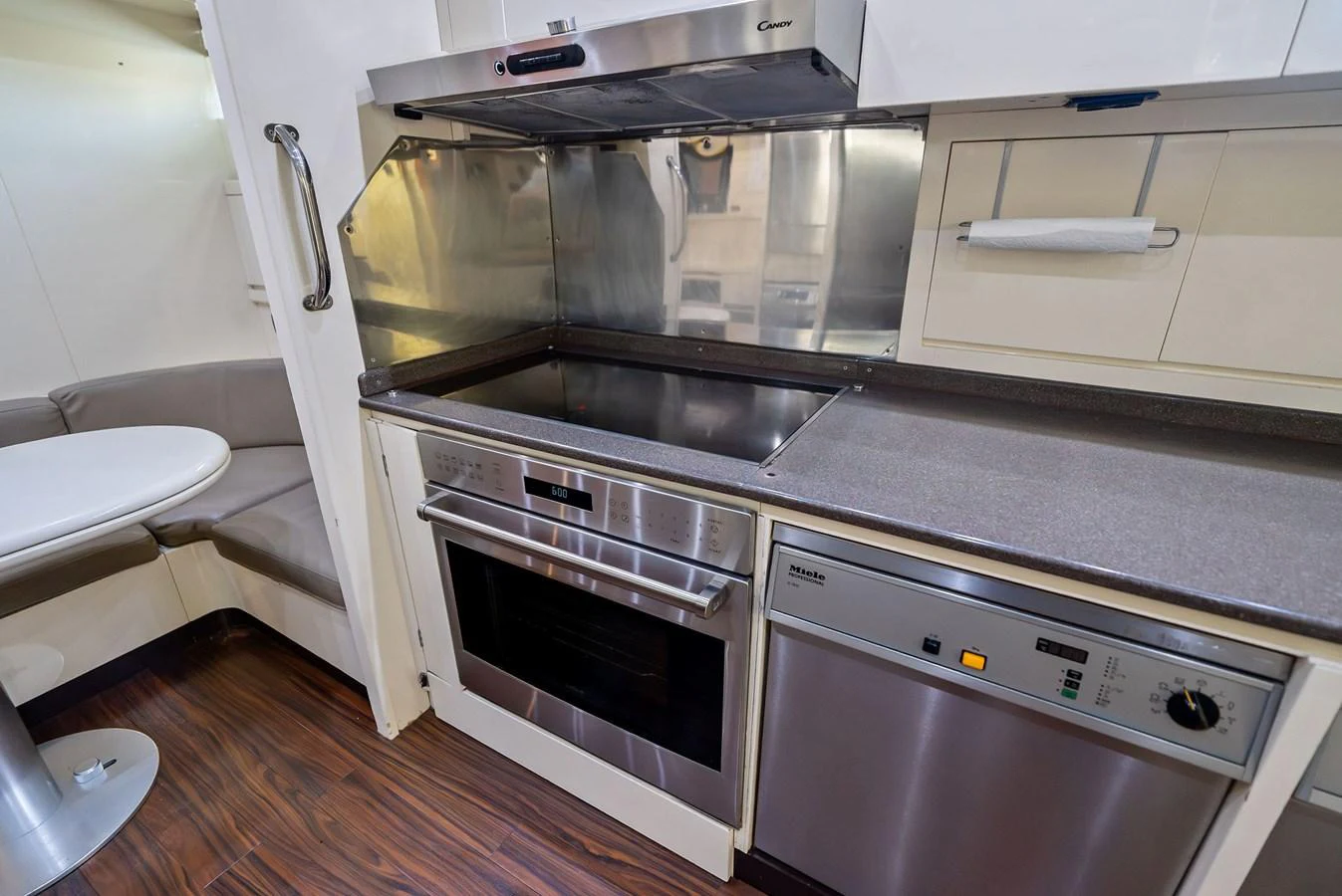 The yacht's galley features modern appliances and a sleek design. aboard INCOGNITO Yacht for Sale