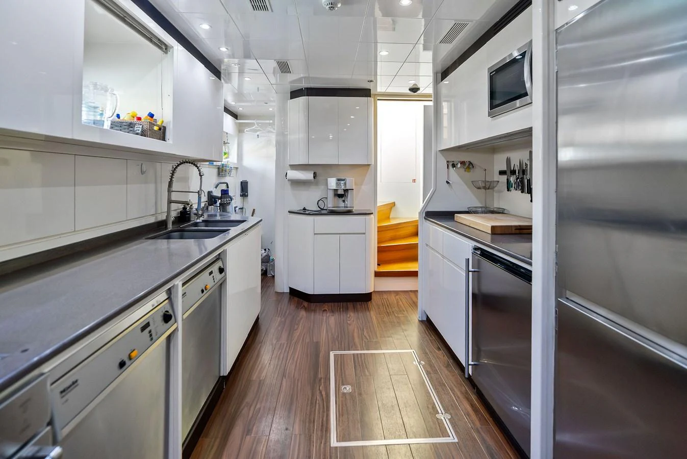 The yacht's galley is equipped with modern appliances and ample counter space, perfect for gourmet meal preparation. aboard INCOGNITO Yacht for Sale