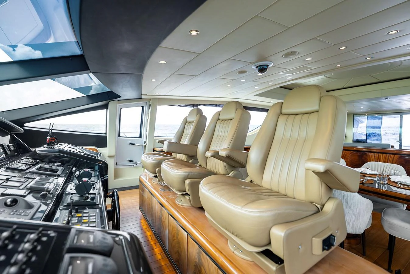 The helm features luxurious leather seating and state-of-the-art navigation equipment. aboard INCOGNITO Yacht for Sale