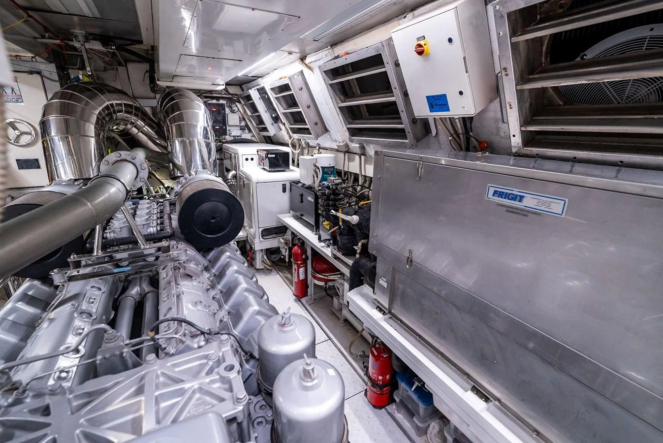The image showcases the yacht's well-maintained engine room with advanced machinery and equipment. aboard INCOGNITO Yacht for Sale