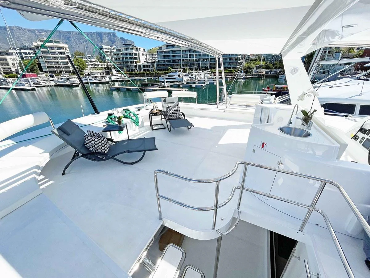 The flybridge offers a spacious and inviting area for relaxation with stunning marina views. aboard SILHOUETTE 800 Yacht for Sale