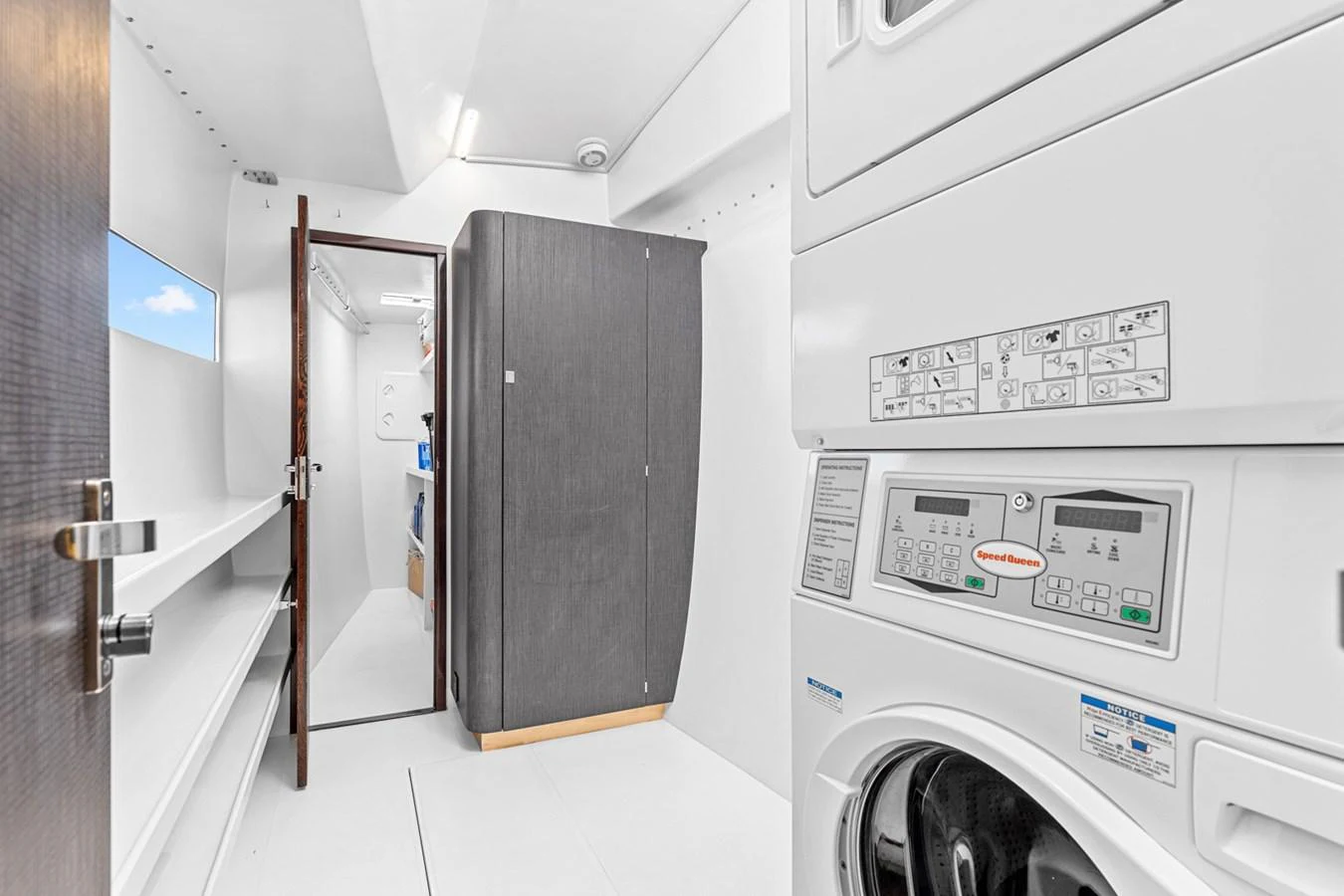 The yacht's laundry room is equipped with modern appliances and ample storage space. aboard SILHOUETTE 800 Yacht for Sale