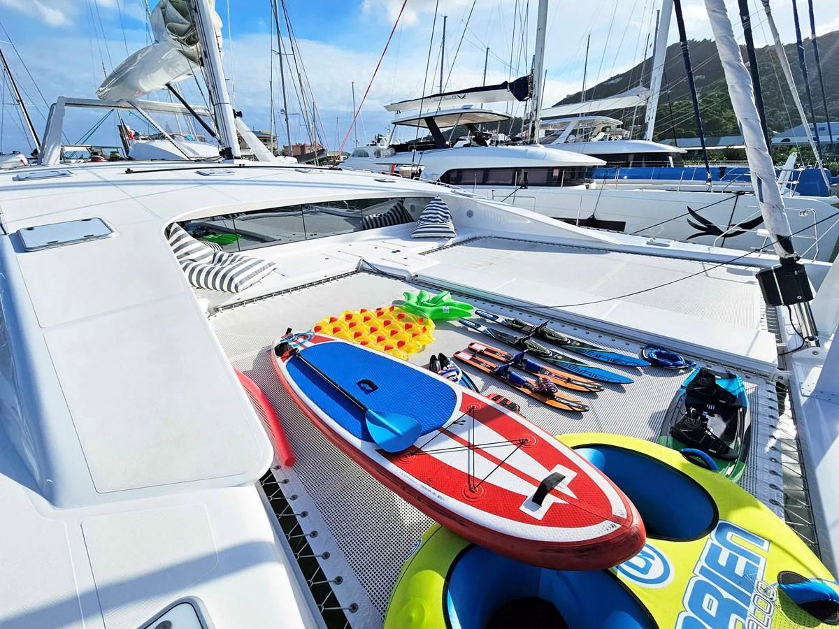 A selection of water toys and equipment is displayed on the deck, ready for adventure. aboard SILHOUETTE 800 Yacht for Sale