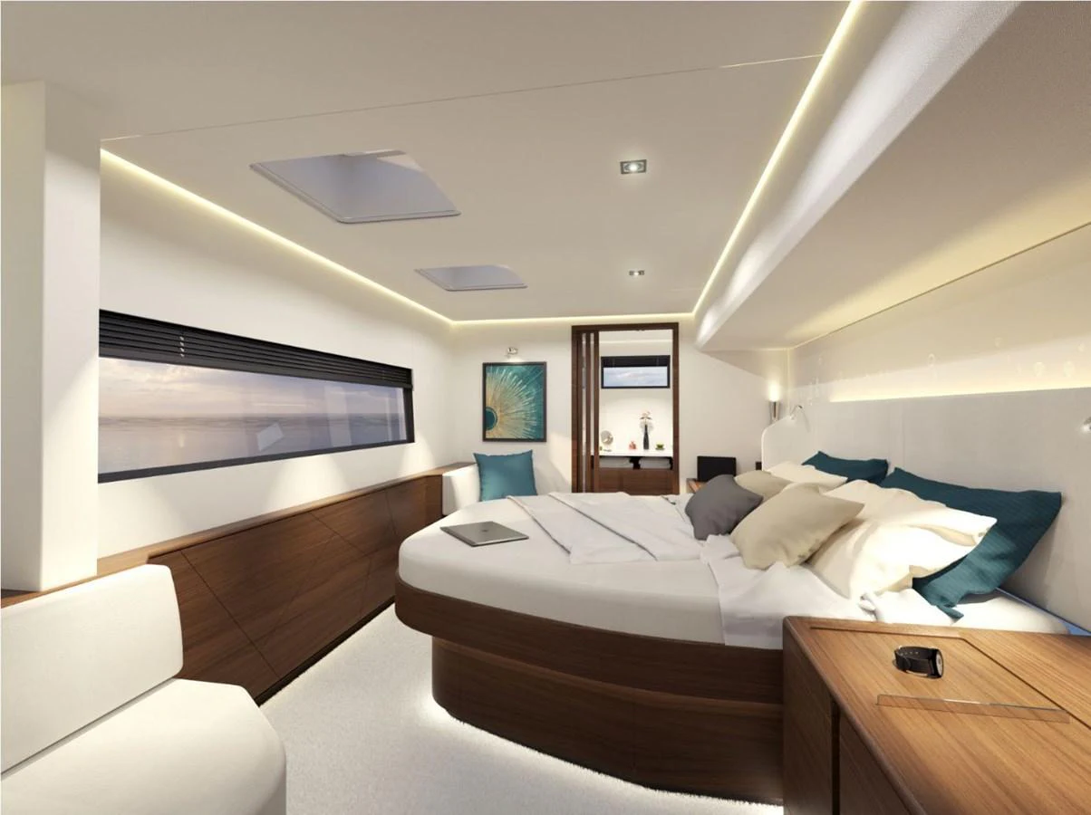 The master stateroom features a luxurious bed with elegant wood accents and modern lighting. aboard AIR YACHT Yacht for Sale