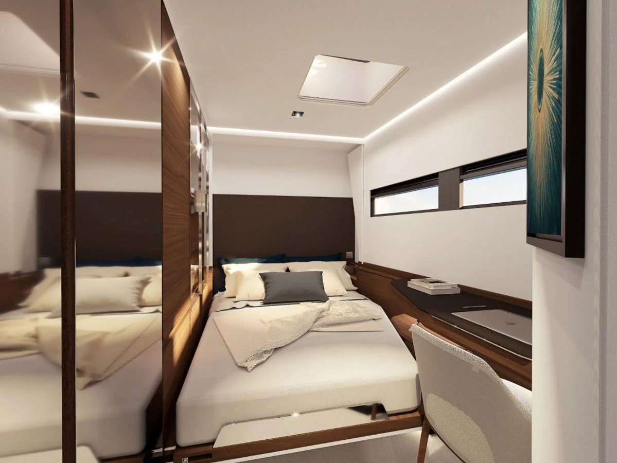 The stateroom features a modern design with a comfortable bed and ample natural light. aboard AIR YACHT Yacht for Sale