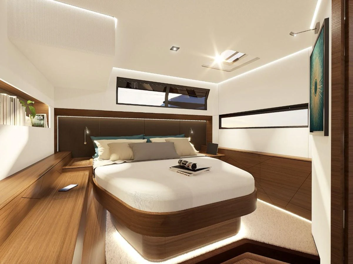 The stateroom features a luxurious bed with modern lighting and elegant wood finishes. aboard AIR YACHT Yacht for Sale
