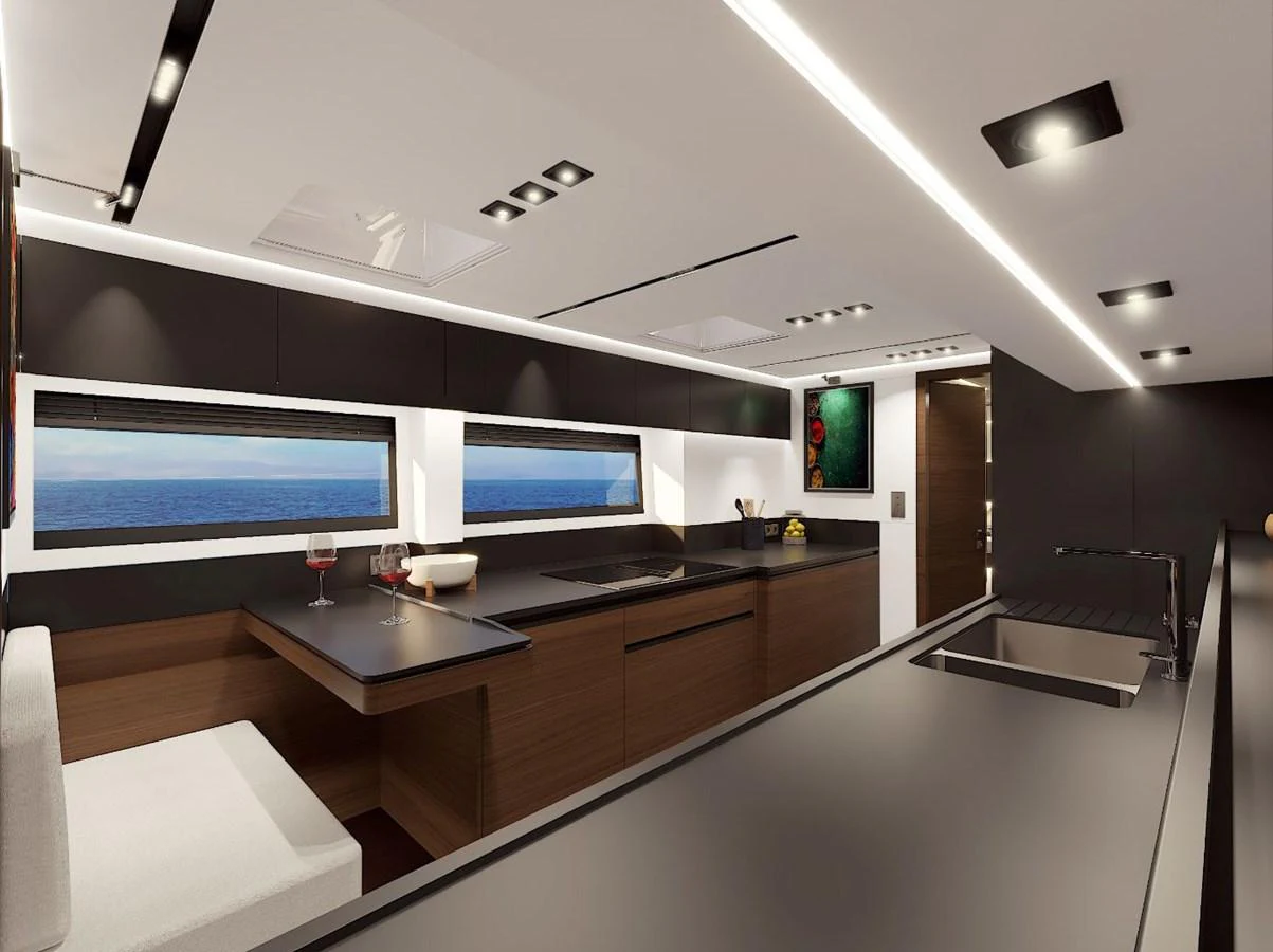 The modern galley features sleek cabinetry and expansive windows with a stunning ocean view. aboard AIR YACHT Yacht for Sale