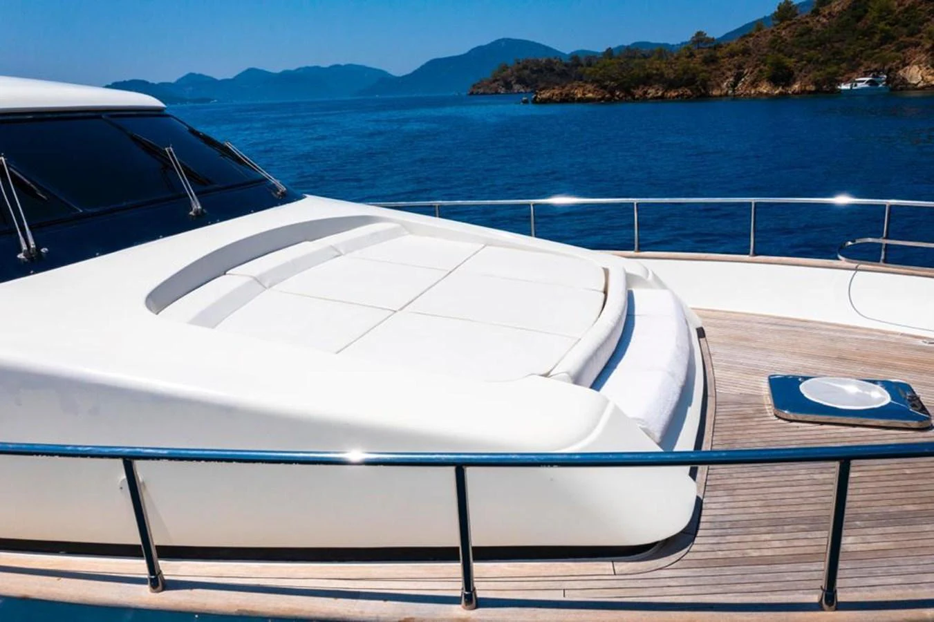 The foredeck features a spacious sunbathing area with plush cushions, perfect for relaxation. aboard BARBAROSSA MORATTI Yacht for Sale