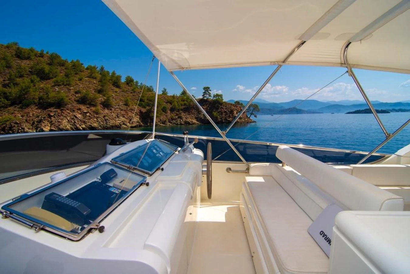 The flybridge offers a stunning view of the serene waters and surrounding landscape. aboard BARBAROSSA MORATTI Yacht for Sale
