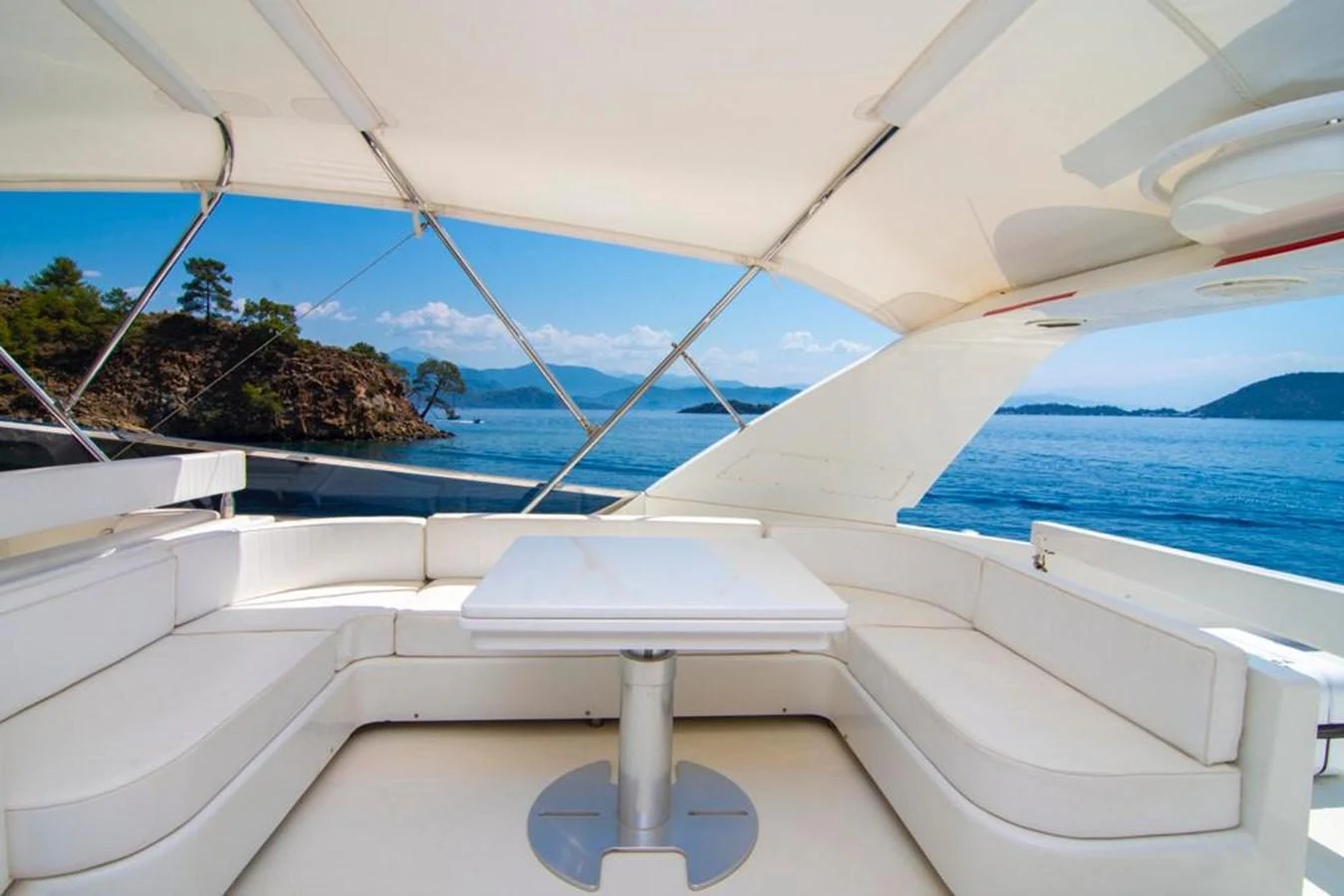 The flybridge offers a spacious seating area with stunning views of the surrounding waters. aboard BARBAROSSA MORATTI Yacht for Sale