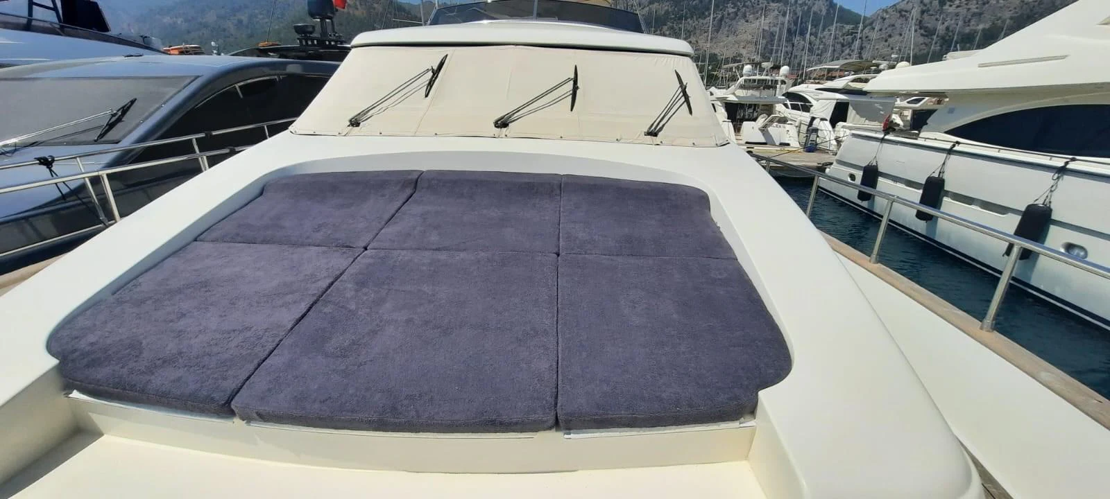 The foredeck of the yacht features a spacious sunpad for relaxation. aboard BARBAROSSA MORATTI Yacht for Sale