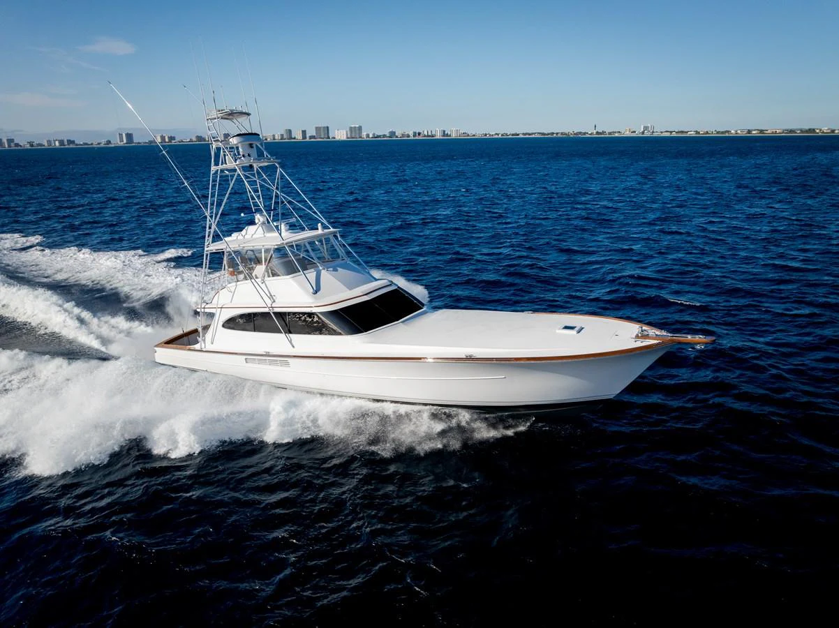 A sleek yacht cruises swiftly through the open water, showcasing its elegant design and powerful performance. aboard NEVER SAY NEVER Yacht for Sale