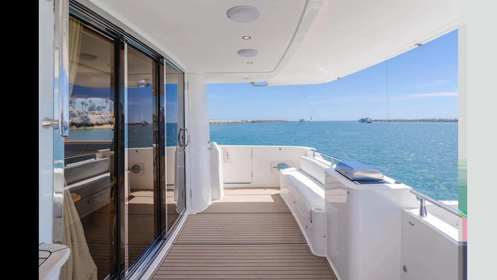 The aft deck offers a spacious and inviting area with stunning views of the water. aboard SEAQUEL Yacht for Sale
