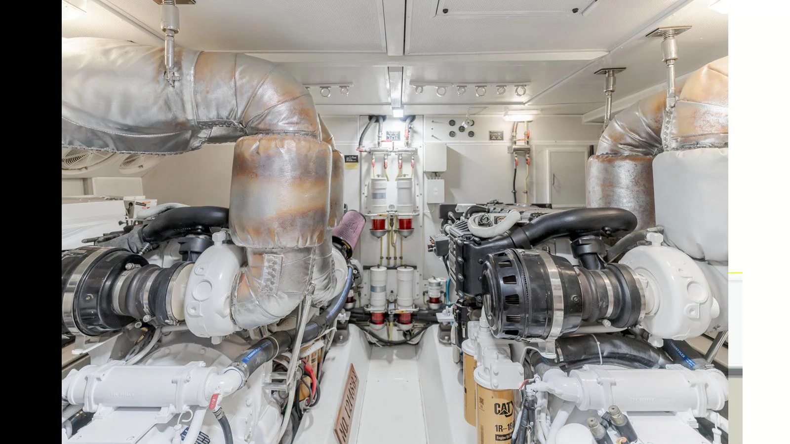 The engine room showcases the yacht's powerful and well-maintained machinery. aboard SEAQUEL Yacht for Sale