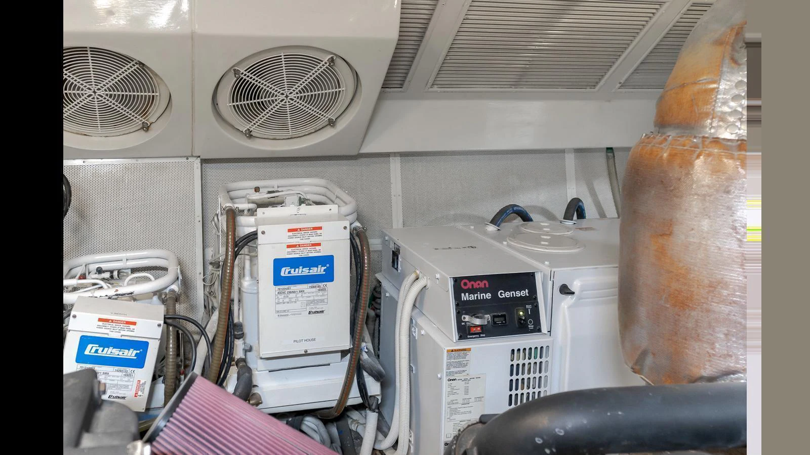The image showcases the yacht's engine room with various machinery and equipment. aboard SEAQUEL Yacht for Sale