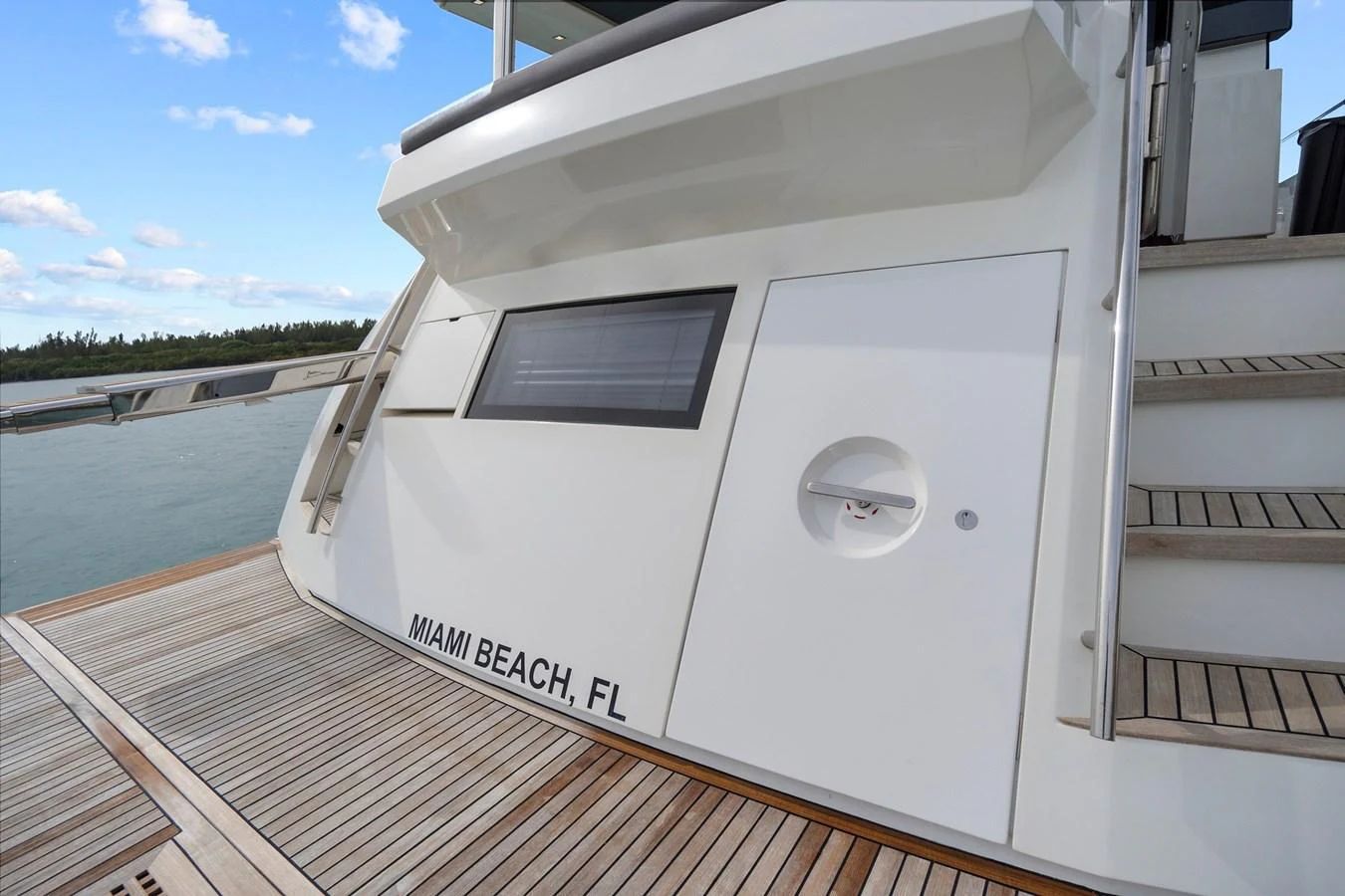 The aft deck of the yacht features a sleek design with a spacious swim platform. aboard JESSEA Yacht for Sale