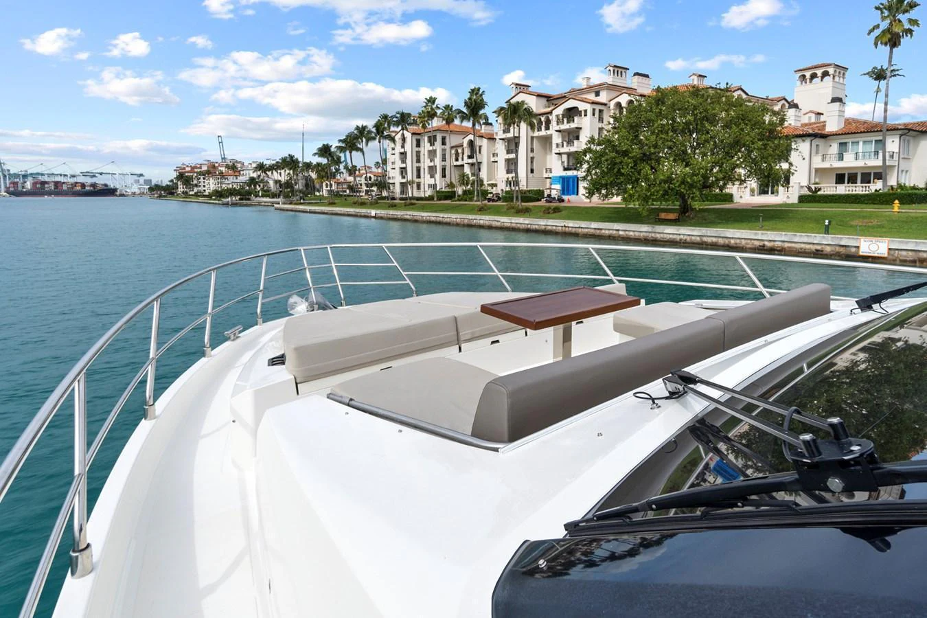 The yacht's bow features a spacious seating area with a table, perfect for enjoying scenic views. aboard JESSEA Yacht for Sale