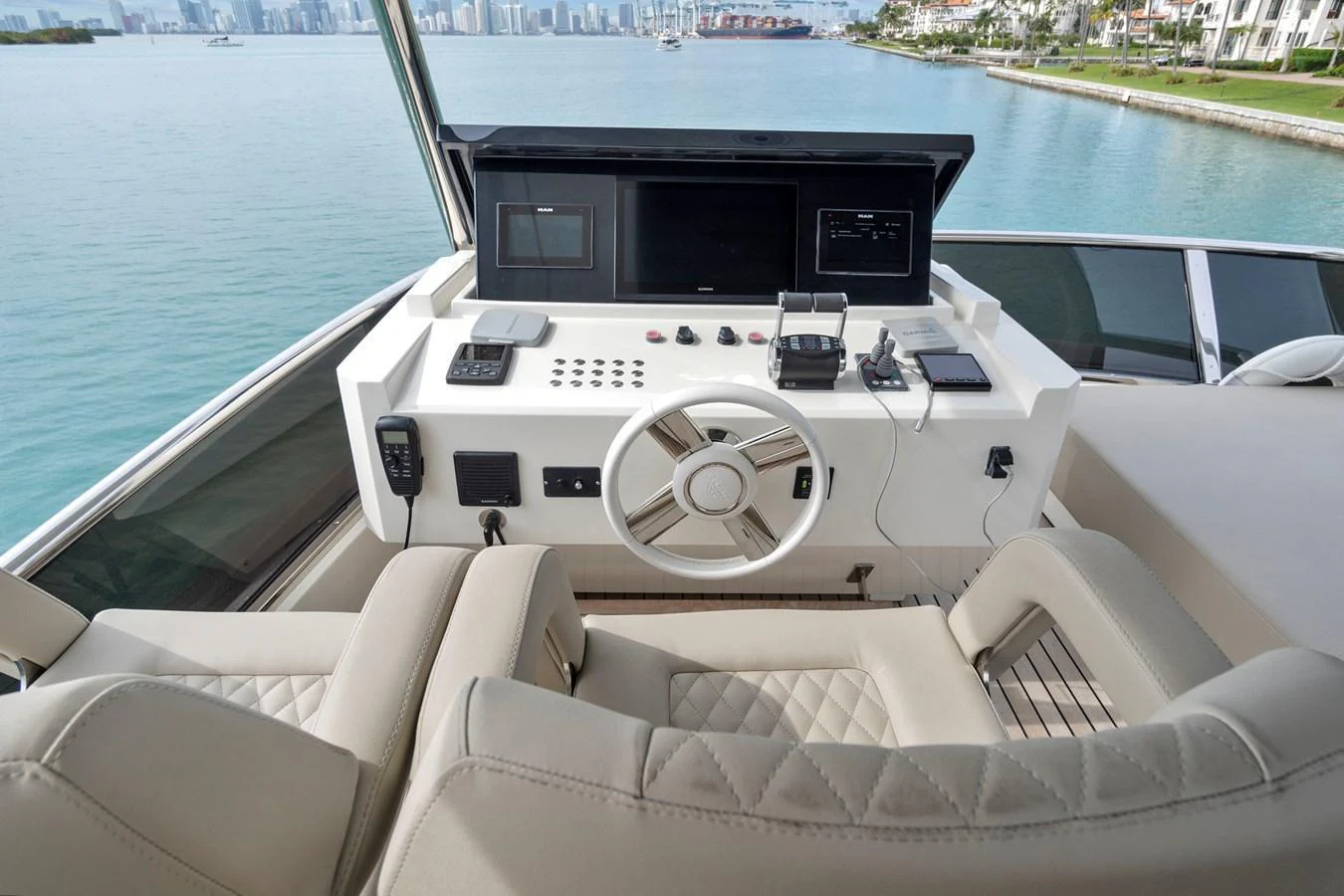 The helm station offers a sophisticated and modern control area with a stunning view of the water. aboard JESSEA Yacht for Sale