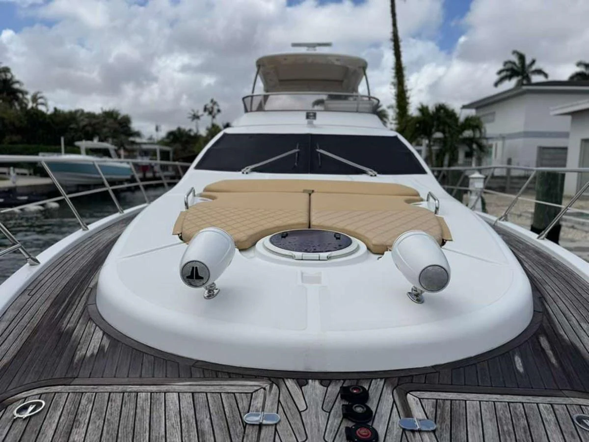The foredeck of the yacht features a spacious sunbathing area with comfortable cushions. aboard TARKAN Yacht for Sale