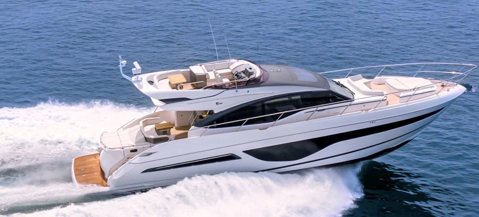 A sleek and modern yacht cruises swiftly across the open water, showcasing its elegant design and luxurious amenities. aboard BK ONE Yacht for Sale