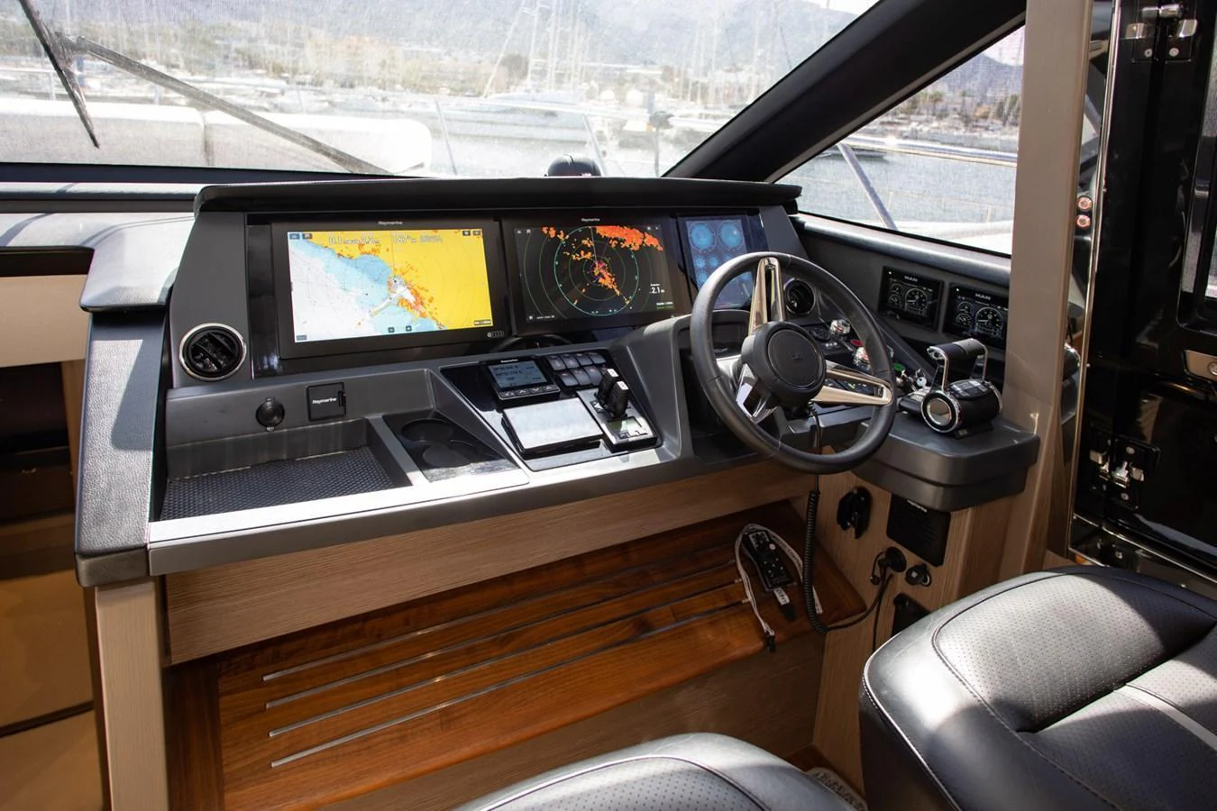 The helm station features advanced navigation equipment and luxurious seating. aboard BK ONE Yacht for Sale