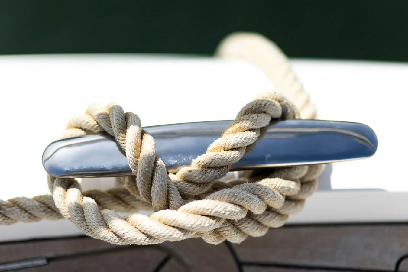 A close-up of a cleat with a neatly tied rope on the yacht's deck. aboard BK ONE Yacht for Sale