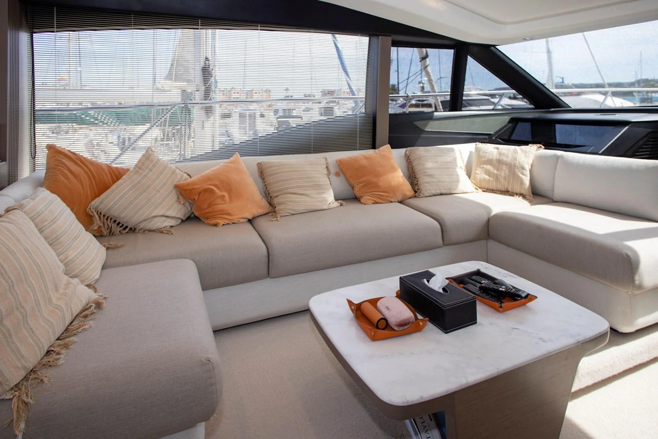 The salon features a spacious and comfortable seating area with large windows offering panoramic views. aboard BK ONE Yacht for Sale