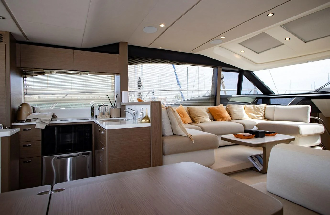 The salon features a spacious and modern design with comfortable seating and a well-equipped galley. aboard BK ONE Yacht for Sale