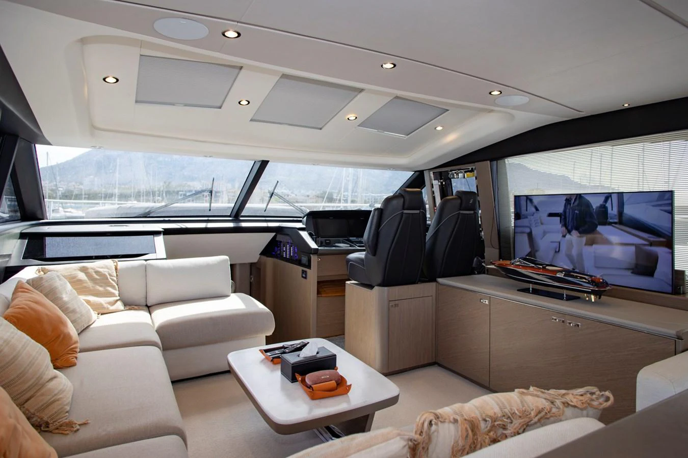 The salon offers a luxurious and comfortable space with plush seating and modern amenities. aboard BK ONE Yacht for Sale