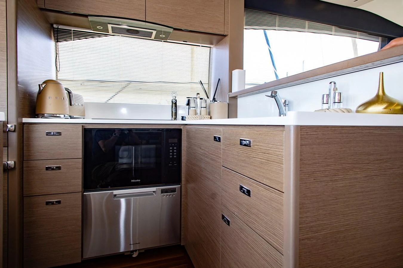 The yacht's galley features modern appliances and sleek cabinetry for a stylish and functional cooking space. aboard BK ONE Yacht for Sale