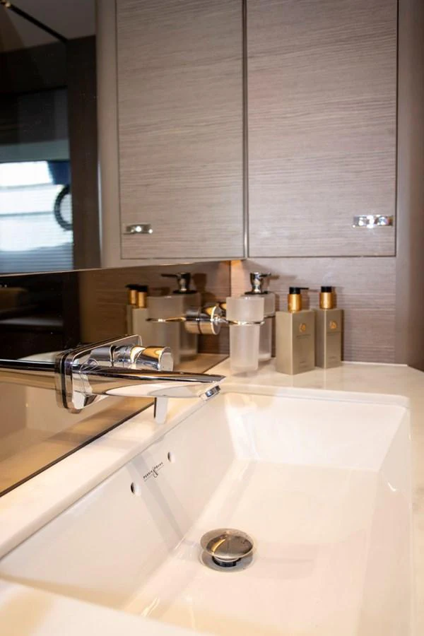 A modern yacht bathroom with sleek fixtures and elegant design. aboard BK ONE Yacht for Sale