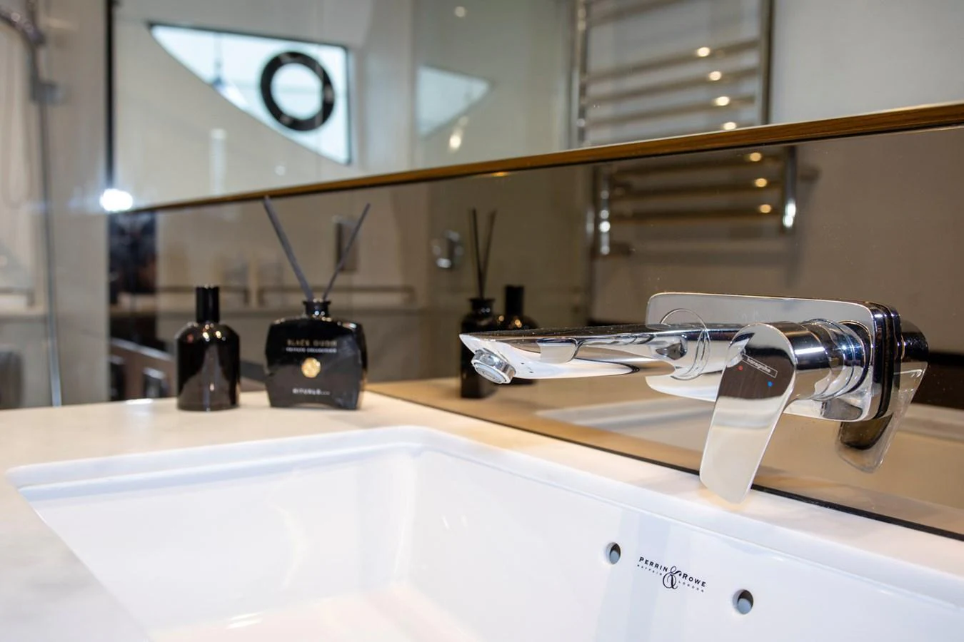 A luxurious bathroom sink with elegant fixtures and stylish accessories. aboard BK ONE Yacht for Sale